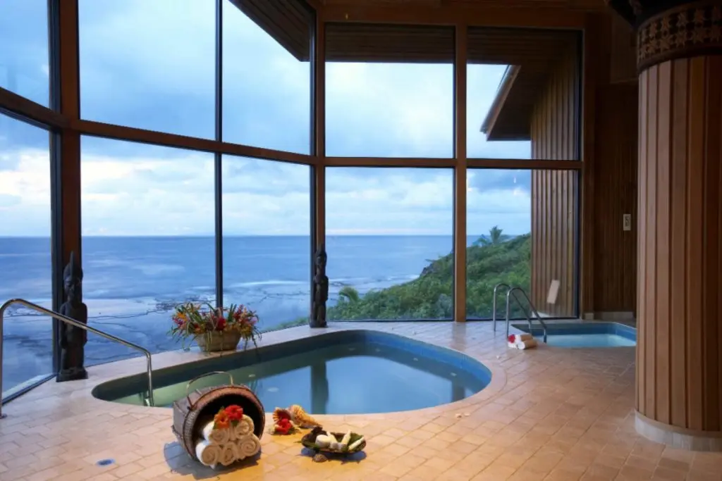 pool with panoramic windows and view to the sea