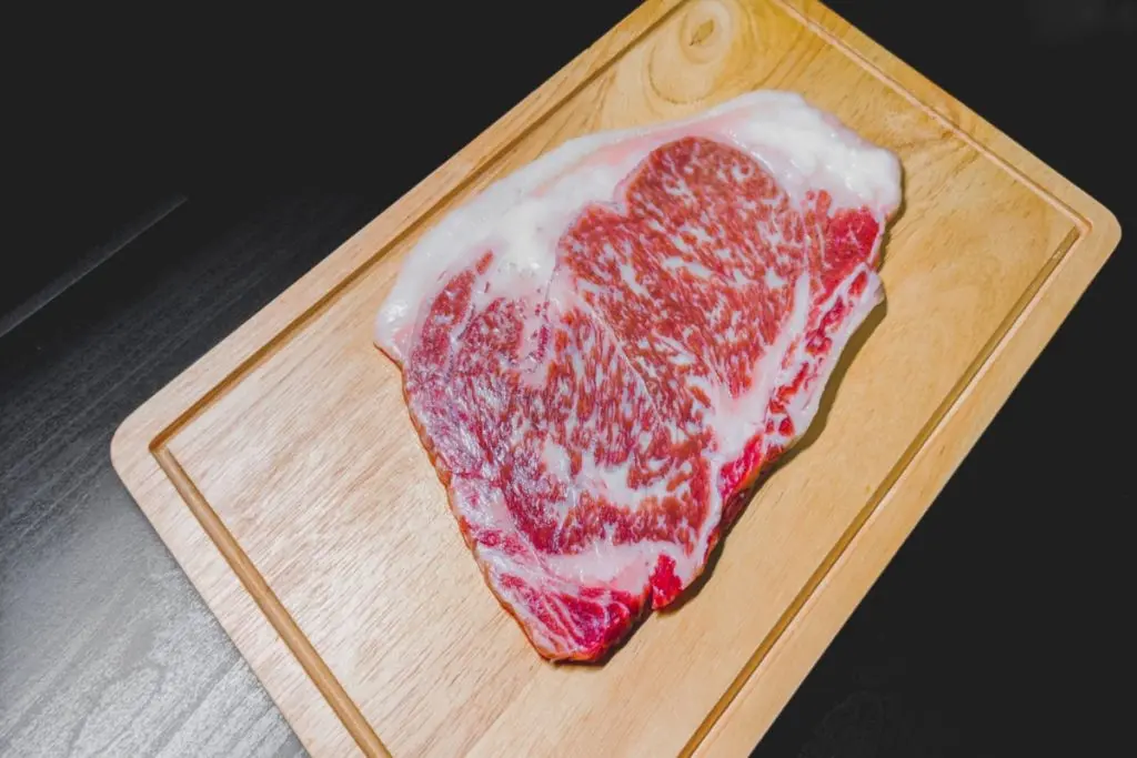 A5 Japanese Wagyu Ribeye on the cooking desk