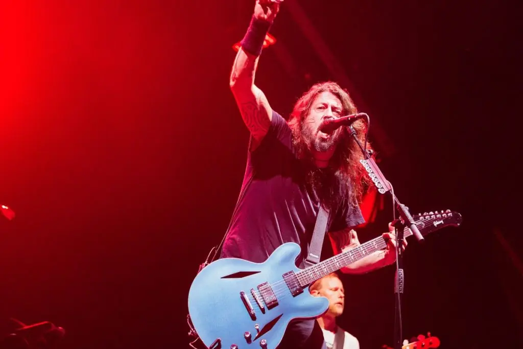 Dave Grohl singing with guitar