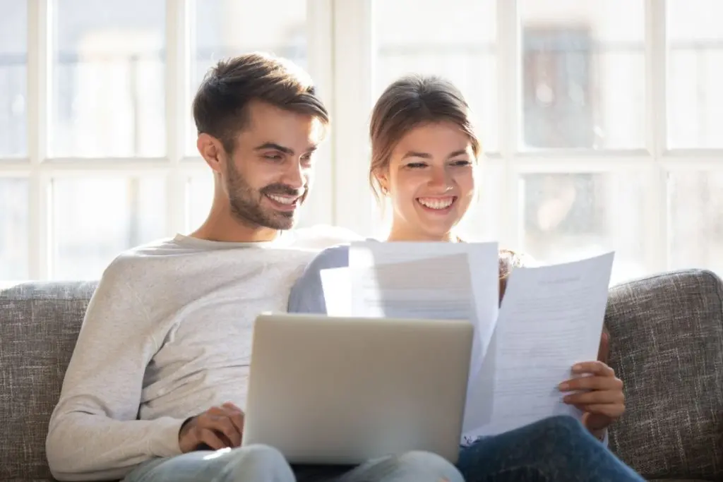Couple researching credit score