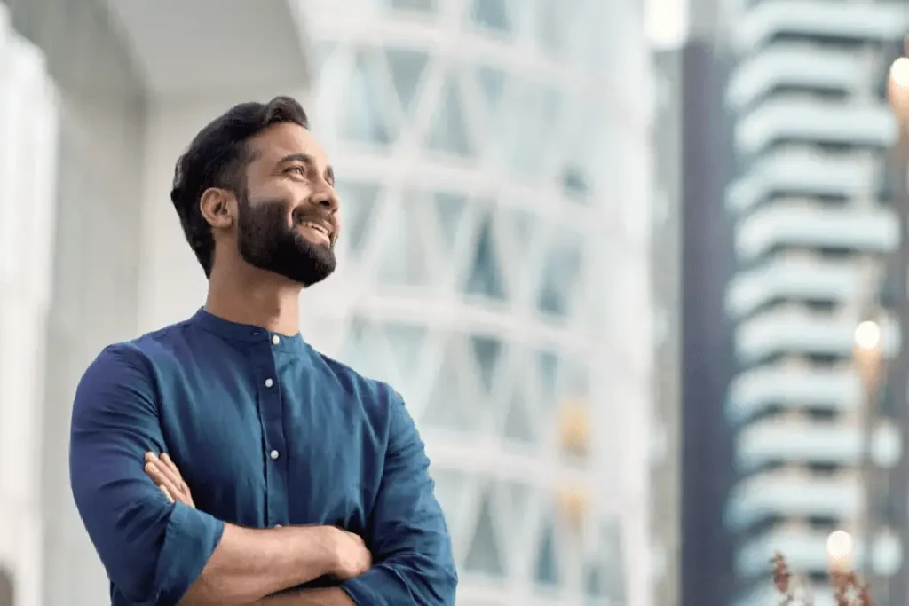 smiling men thinking about financial goals