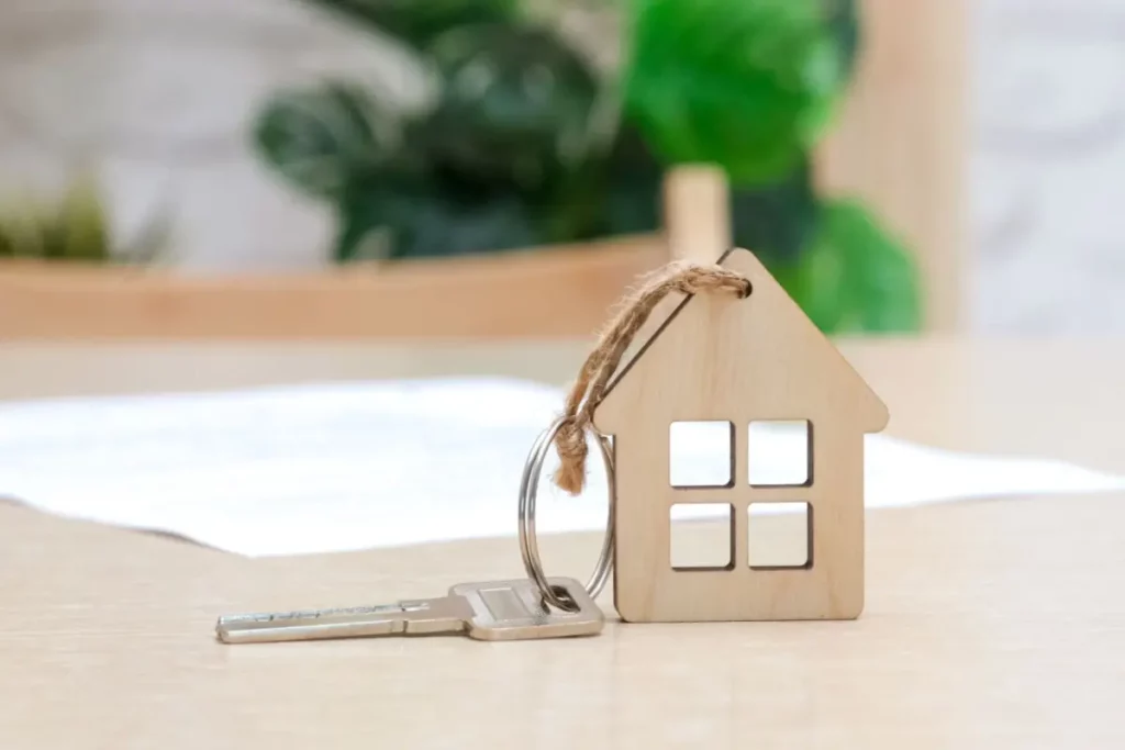 keychain with a wooden house