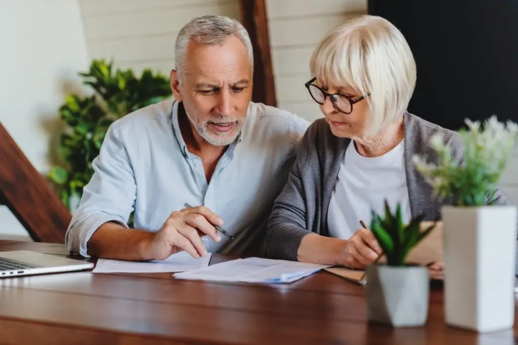 Retired couple studying finances