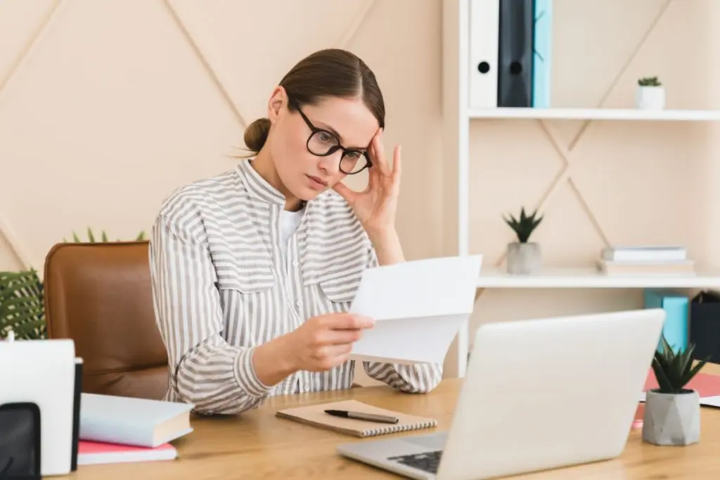 Woman reviewing loan document